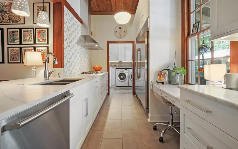 Kitchen desk and laundry room in background