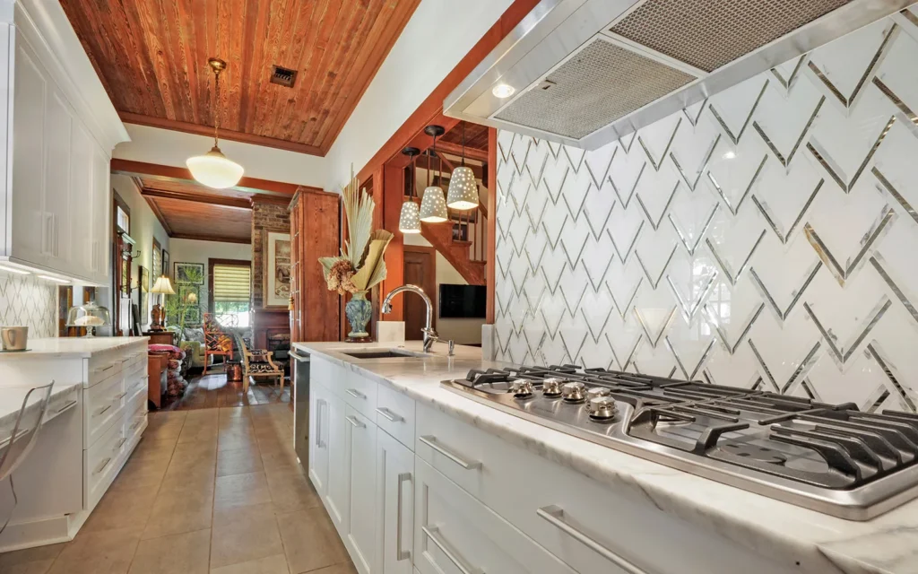 Beautiful backsplash and white cabinets