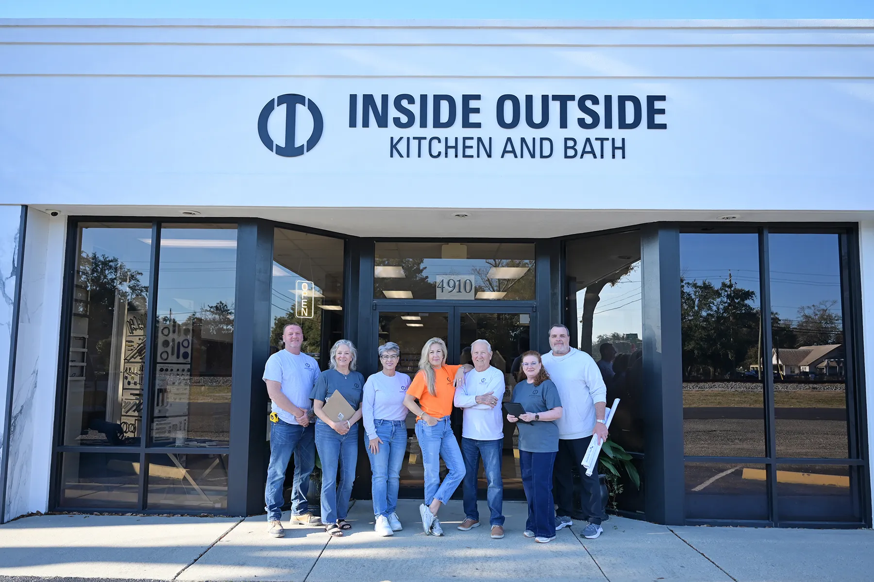 Group photo with store front Inside Outside Kitchen and Bath